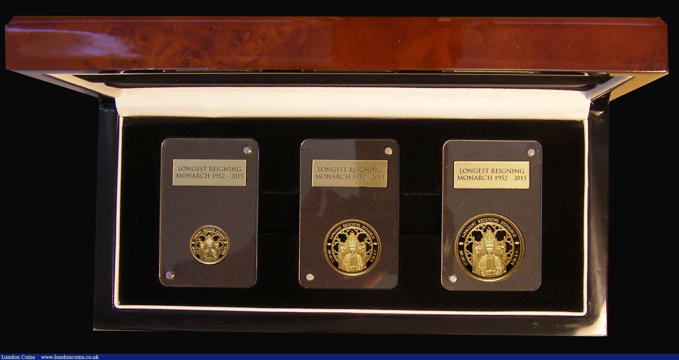 London Coins : A173 : Lot 751 : Tristan da Cunha 'The Longest Reigning Monarch' a 3-coin set in gold comprising Sovereign ...