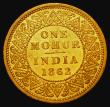 London Coins : A173 : Lot 1398 : India Gold Mohur 1862 Calcutta Mint, with V on bust and with two flowers in lower panel, KM#480 GVF ...