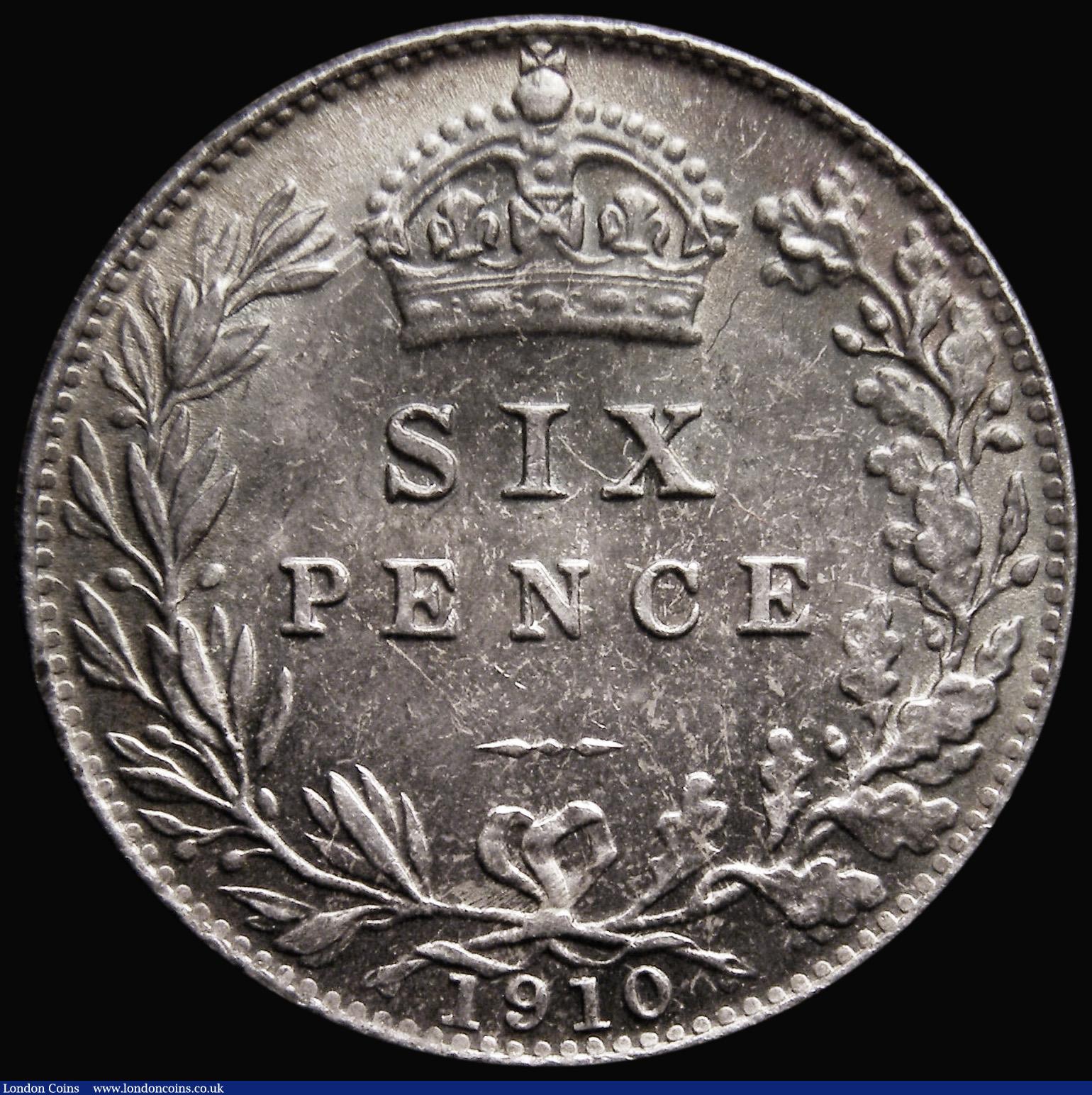 London Coins : A175 : Lot 1799 : Sixpence 1910 ESC 1794, Bull 3606 UNC and beautifully toned, with green, blue, gold and hints of red...