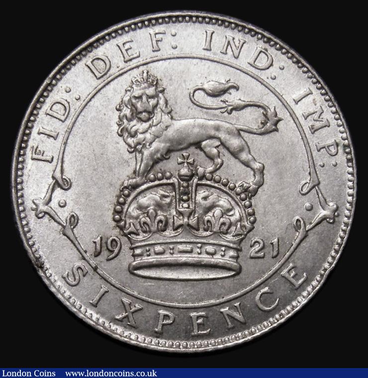 London Coins : A175 : Lot 1810 : Sixpence 1921 ESC 1807, Bull 3884, UNC a superb example with golden toning, the 1921 and 1922 issues...