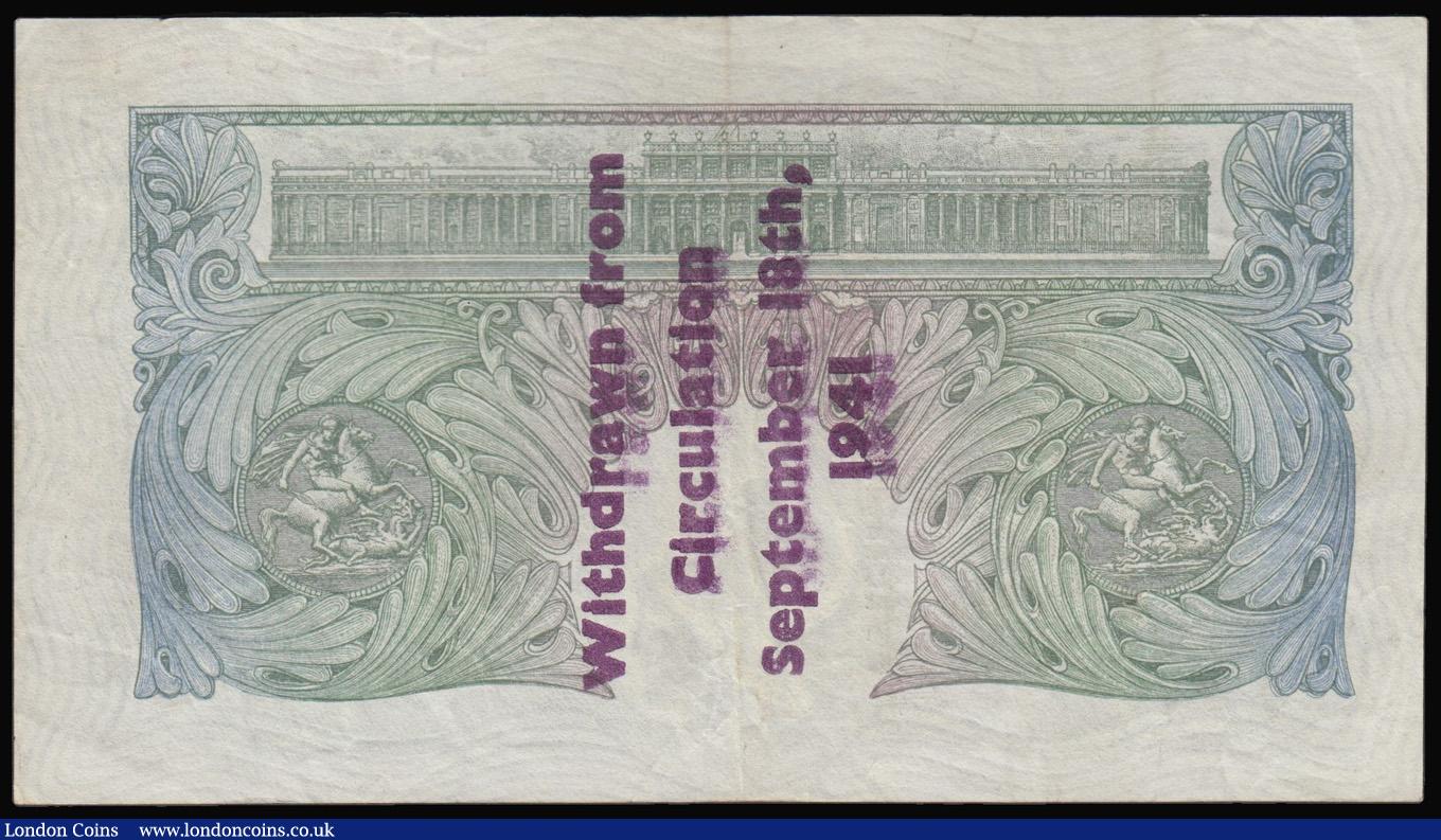 London Coins : A175 : Lot 33 : One Pound Peppiatt B239A Guernsey overprint serial E15A 761471, "Withdrawn from circulation Sep...