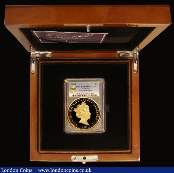 Alderney Five Pounds 2019 200th Anniversary of the Birth of Queen Victoria, Reverse: Una and the Lion, Gold Proof a superb rendition of the classic William Wyon design first used on the legendary Gold Five Pounds of 1839. FDC in a PCGS holder and graded PR69 DCAM, in the impressive Commonwealth Mint wooden box of issue with certificate : World Cased : Auction 175 : Lot 633