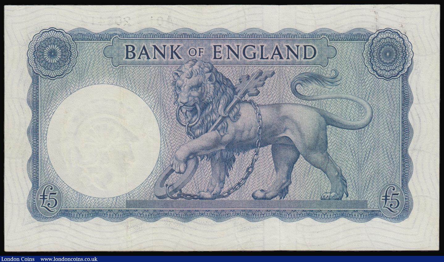 London Coins : A176 : Lot 109 : Five Pounds O'Brien B277 issued 1957, a scarce FIRST RUN series A01 206412, Helmeted Britannia ...