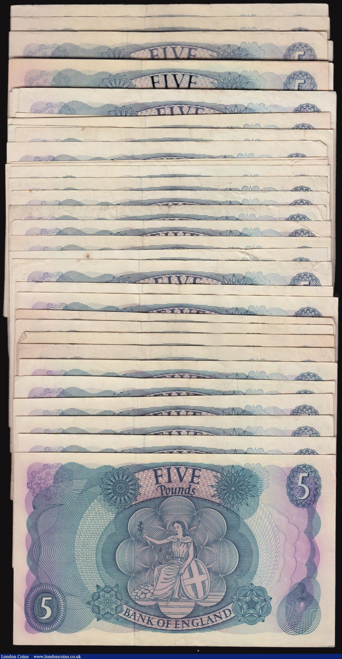 London Coins : A176 : Lot 114 : Five Pounds (66) Hollom B297 (63) all but one are A prefixes, Fforde B312 (3) a small hoard Good Fin...