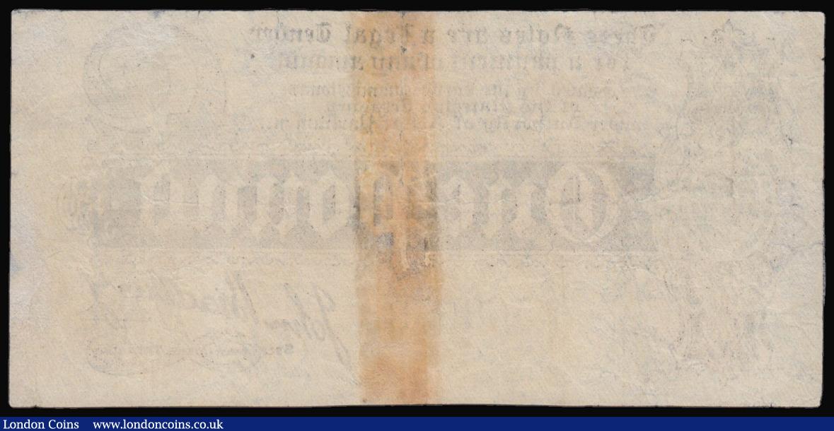 London Coins : A176 : Lot 29 : One Pound Bradbury T1 issued 1914 series A.568538, perhaps VF for overall wear but with a central br...