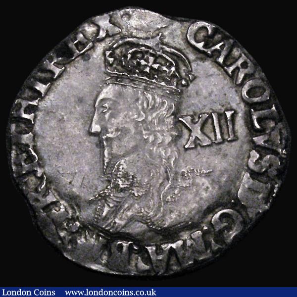 Shilling Charles I Group D, Fourth Bust, type 3a, No inner circles, Reverse: Round garnished shield, S.2791, mintmark Tun, 5.89 grammes, VF/GVF with superb shield detail, a most eye-catching example and scarce thus : Hammered Coins : Auction 177 : Lot 1302