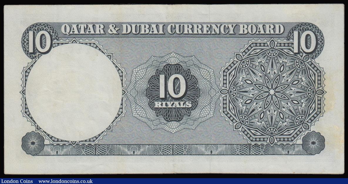 London Coins : A177 : Lot 157 : Qatar & Dubai 10 Riyals issued 1960s series I/7 445689, Pick3a, VF or better faint stains revers...