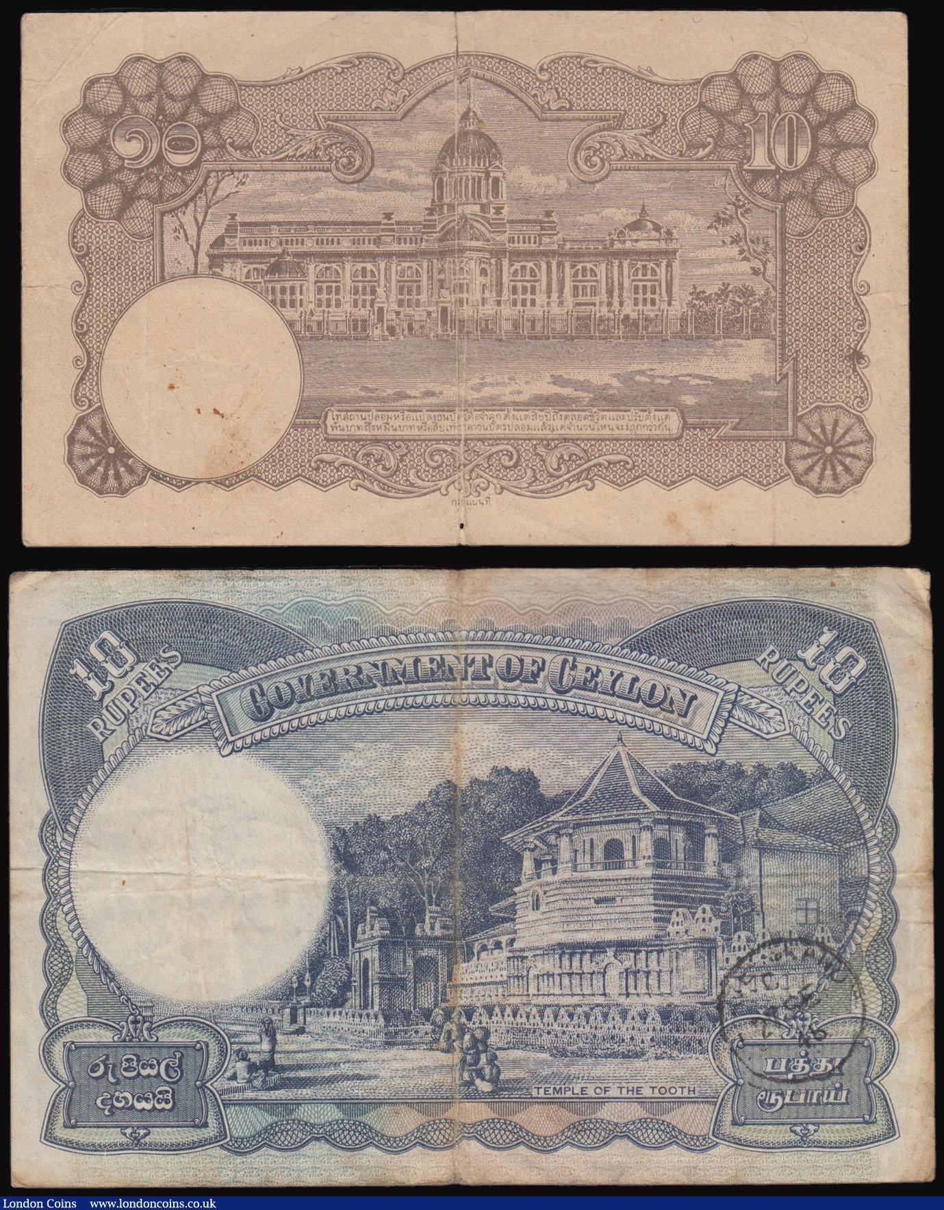 London Coins : A177 : Lot 196 : Thailand 10 Baht (1943) signature 20 Pick 40b probably Fine for wear but with a 10 mm tear at top ce...