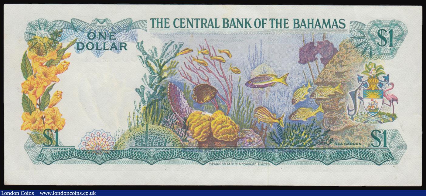 London Coins : A177 : Lot 74 : Bahamas One Dollar 1974 issue, Green on multicoloured underprint, signature Allen, Pick 35b, serial ...