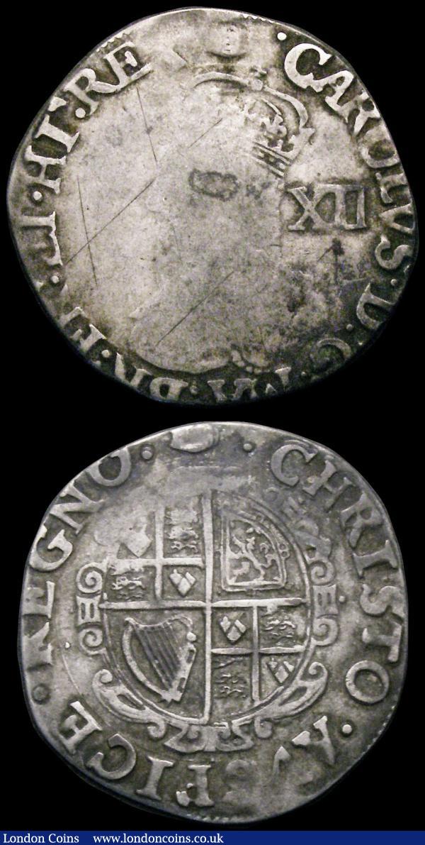 Shillings Charles I (2) Group 3a, No inner circles, S.2972, no stops on obverse mintmark Crown Fine, the reverse better, the obverse with a long cross-shaped scratch, S.2791 mintmark Tun VG with scratches : Hammered Coins : Auction 178 : Lot 1003