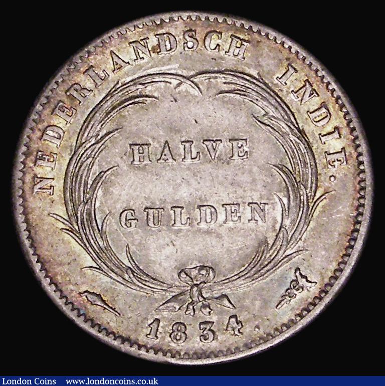 London Coins : A179 : Lot 1199 : Netherlands East Indies Half Gulden 1834 KM#302 VF or better with touches of attractive and colourfu...