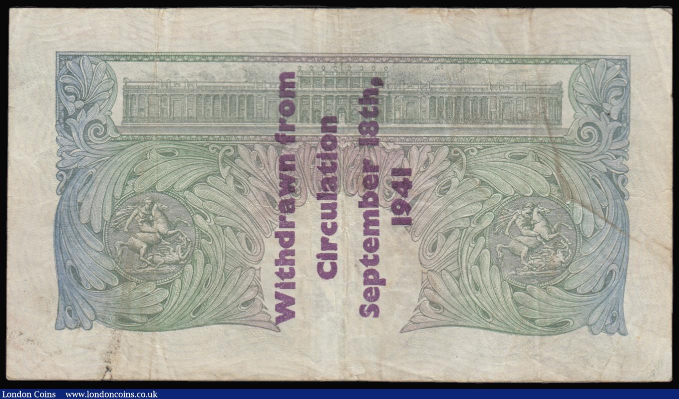 London Coins : A179 : Lot 17 : One Pound Peppiatt Guernsey Overprint B239A, serial number E45A 269642 'Withdrawn from Circulat...