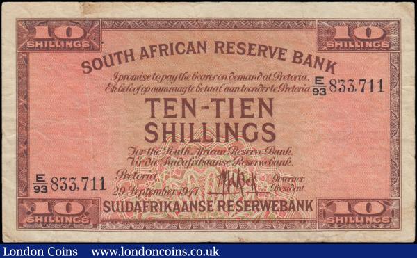 South Africa Reserve Bank 10 Shillings Pick 82e last year for this issue dated 29th September 1947 serial number E/93 833711 signature de Kock, English and Afrikaans text. The note in dark brown on pink and pale green underprint featuring South Africa Coat of Arms on reverse and watermarked sailing ship and portrait J. van Riebeeck. VF Pinholes  : World Banknotes : Auction 180 : Lot 261