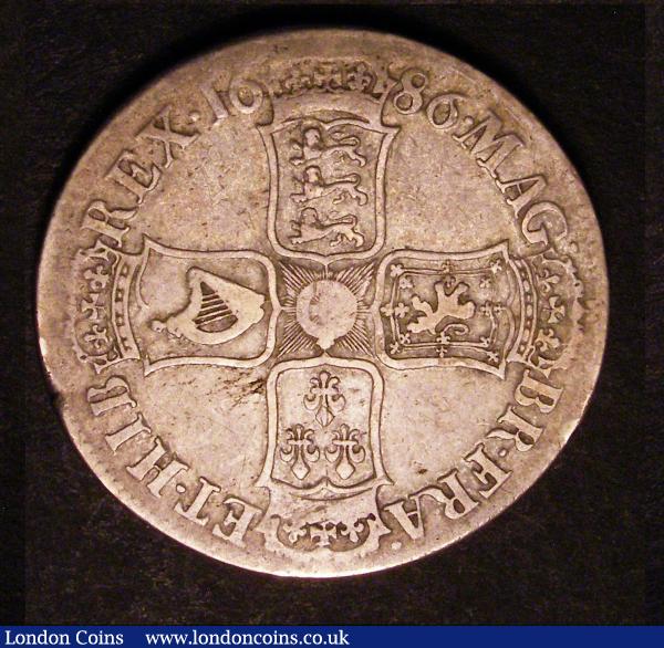 Crown 1686 First Bust, SECVNDO edge, ESC 76, Bull 740 Fine/About Fine, and listed as scarce by ESC : English Coins : Auction 180 : Lot 1229