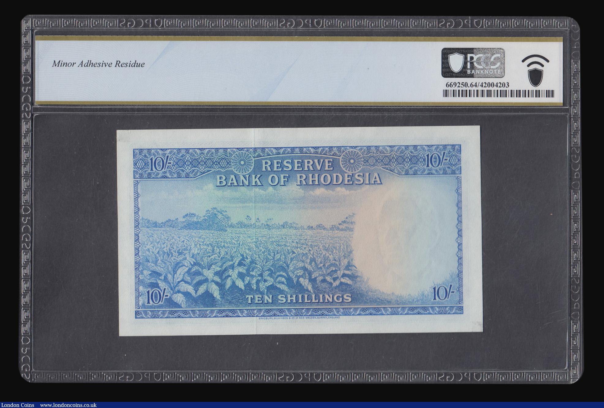 London Coins : A180 : Lot 204 : Rhodesia 10 shillings dated 14 October 1964, QE2 portrait, prefix H/3, Pick24a, Choice Unc and grade...