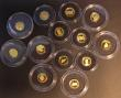 London Coins : A180 : Lot 725 : World in Gold - The Smallest Gold Coins of the World 2007-2010 a 24-coin set, includes examples from...