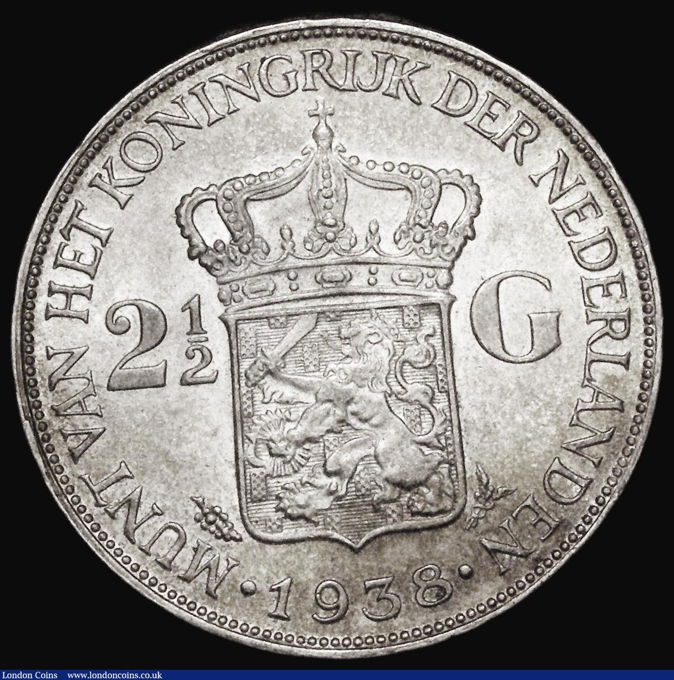 London Coins : A182 : Lot 1271 : Netherlands 2 1/2 Gulden 1938 Deep Hair lines KM#165 Unc and nicely toned with a black toning spot o...