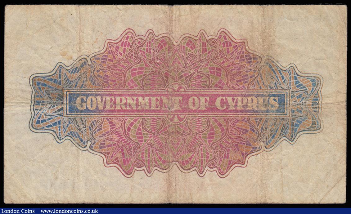 London Coins : A182 : Lot 138 : Cyprus 5 Shillings dated 1st November 1950 series F/2 386821, KGVI portrait at centre, Pick22, VG-Fi...