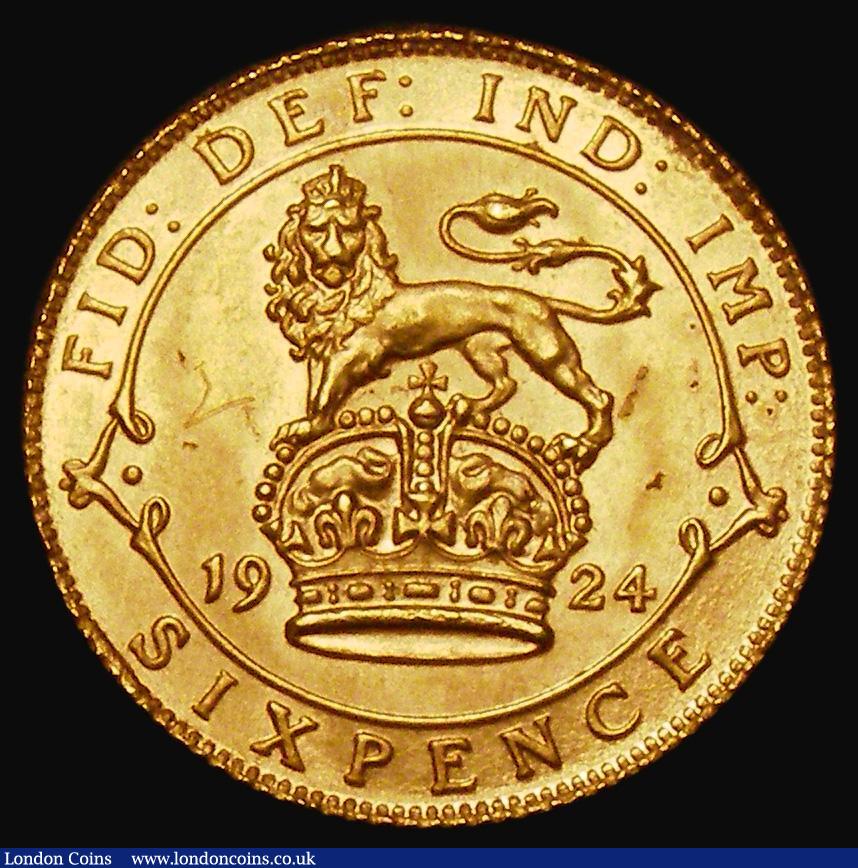 London Coins : A182 : Lot 2011 : Sixpence 1924 Trial strike in gold, Obverse with number 2 officially stamped before the King's ...