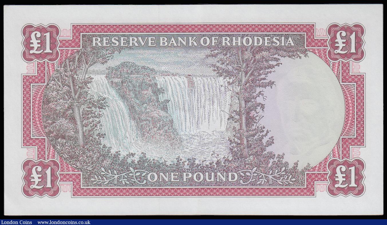 London Coins : A182 : Lot 214 : Rhodesia Reserve Bank 1 Pound dated 18th August 1967 series K/20 401036, Pick28b, portrait QEII at r...