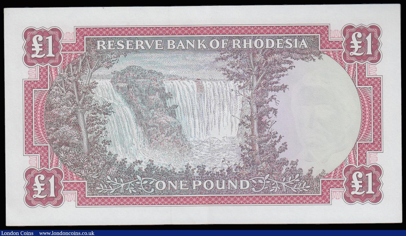 London Coins : A182 : Lot 215 : Rhodesia Reserve Bank 1 Pound dated 18th August 1967 series K/20 401037, Pick28b, portrait QEII at r...