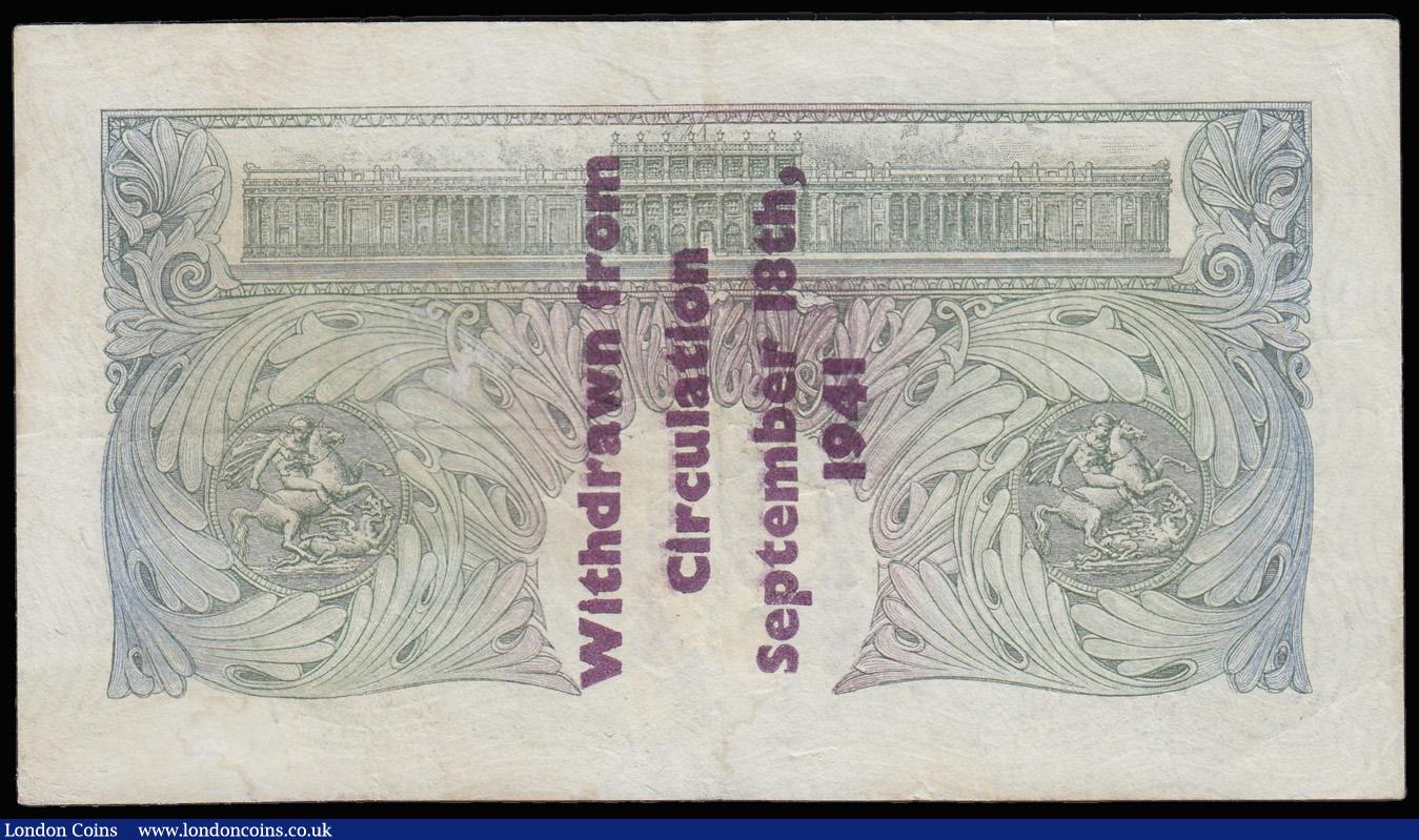 London Coins : A182 : Lot 31 : One Pound Peppiatt B239A Guernsey overprint series C06A 064094, 'Withdrawn from circulation Sep...
