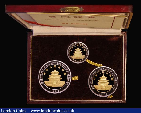 China - Peoples Republic Proof set 1995 Panda Set, a 3-coin Bimetallic set in gold and silver set comprising 50 Yuan 1995 (Half Ounce .999 Gold and One Fifth Ounce .999 Silver) KM#725, 25 Yuan (Quarter Ounce .999 Gold and One Eighth Ounce .999 Silver) KM#724, and 10 Yuan (One Tenth Ounce .999 Gold and 1/28th Ounce .999 Silver) KM#772, nFDC to FDC in the box of issue with certificate : World Cased : Auction 183 : Lot 521