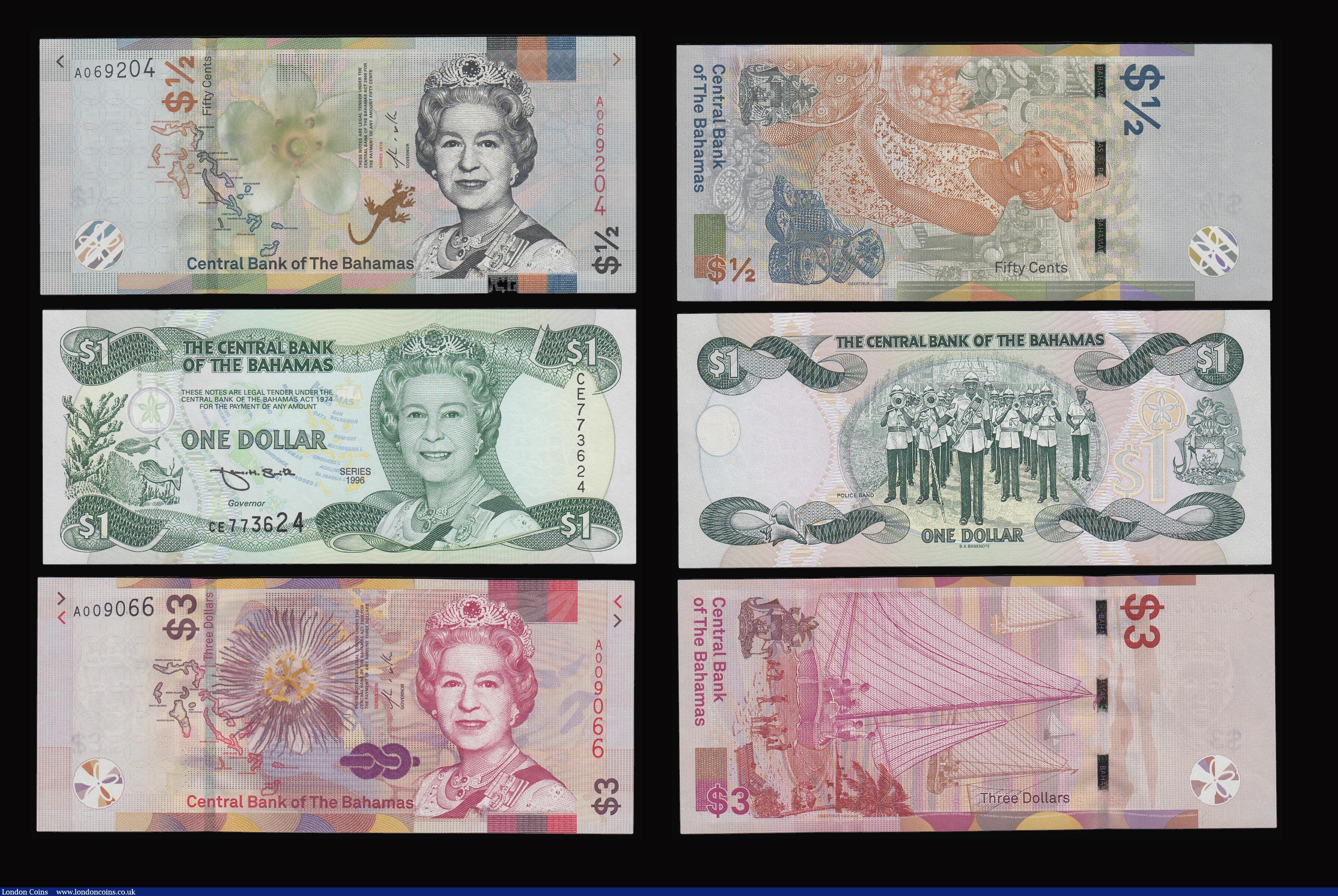 London Coins : A184 : Lot 156 : Bahamas in high grades $1/2 L1965 Pick 17a, $1/2 L1968 Pick 26, $1/2 Pick 42, Dollar Pick 43b Smith,...