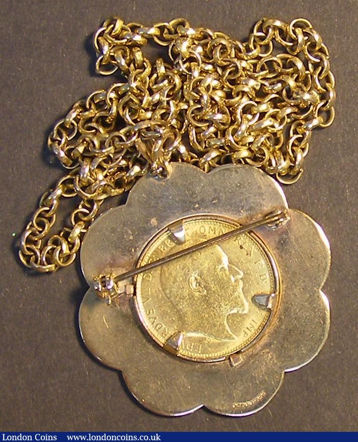 London Coins : A184 : Lot 2120 : Sovereign 1907 Marsh 179, S.3969 NVF with some spots and contact marks, in an ornate 9 carat gold mo...