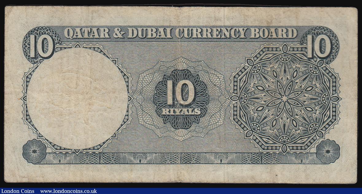 London Coins : A184 : Lot 329 : Qatar & Dubai 10 Riyals issued 1960s series I/1 275226, Pick3a, Fine or near so