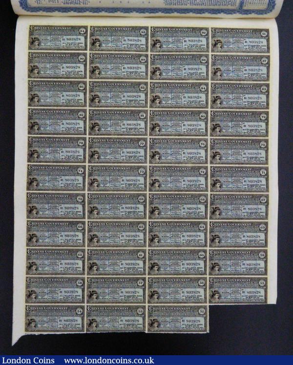 China, Chinese Government 1913 Reorganisation 5% Gold Loan, Bond for £100, Hong Kong and Shanghai Banking Corporation, London issue, black and blue with 43 coupons, Good Fine with a pencil annotation and with several pinholes at the top,  : Bonds and Shares : Auction 184 : Lot 4