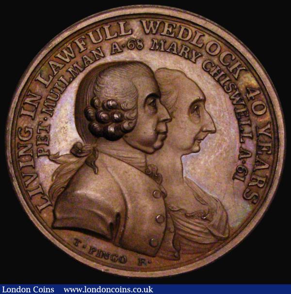 40th Wedding Anniversary of Peter and Mary Mullman 33mm diameter in copper, by T. Pingo, Obverse: Conjoined draped busts of Peter and Mary Mullman right, LIVING IN LAWFULL WEDLOCK 40 YEARS / PET . MULLMAN A. 68 MARY CHISWELL A.61, Reverse: View of a building, hill to left with gazebo at the top, KIRBY HALL, Exergue: 28 APR. 1774, BHM 191, Toned UNC with old ticket. Note: Peter Mullman, eminent  Dutch Merchant of Kirby Hall, Essex, married Mary Trench Chiswell, daughter of Richard Chiswell of Debden Hall, near Newport and Saffron Walden. This unusual medal was a private commission in 1774 from noted medallist Thomas Pingo : Medals : Auction 185 : Lot 1067