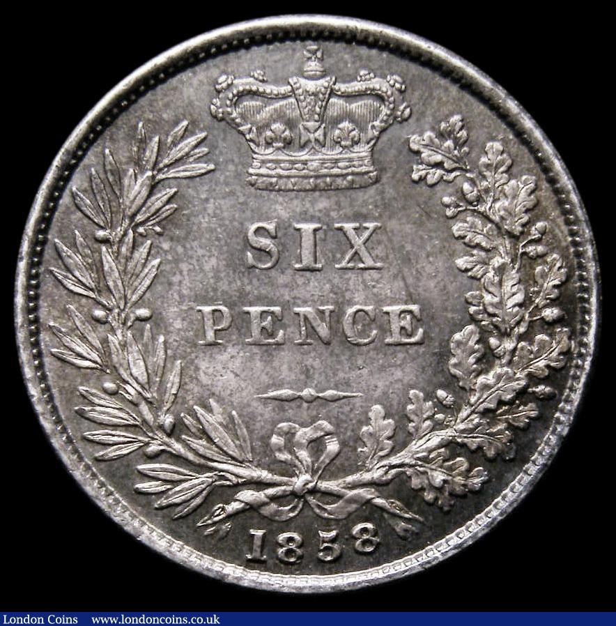 London Coins : A185 : Lot 1823 : Sixpence 1858 ESC 1706, Bull 3200, Davies 1058 dies 2A, UNC with gold, blue/green and magenta tone, ...
