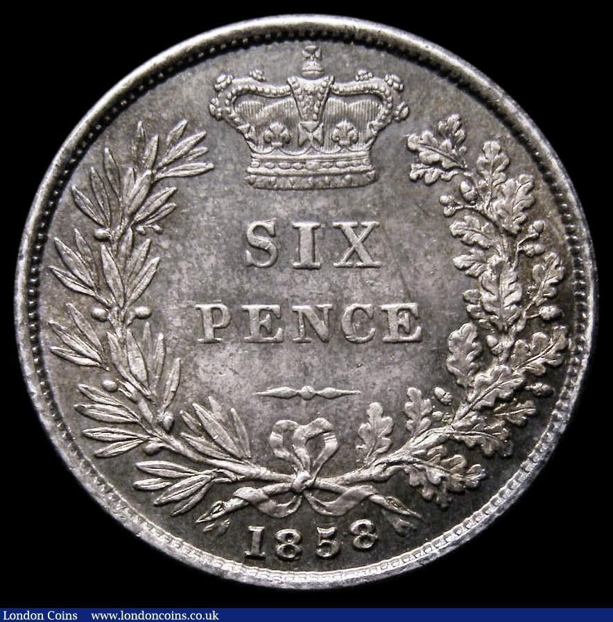 London Coins : A185 : Lot 1823 : Sixpence 1858 ESC 1706, Bull 3200, Davies 1058 dies 2A, UNC with gold, blue/green and magenta tone, ...