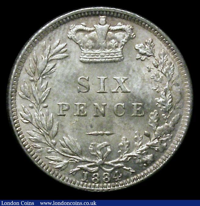 London Coins : A185 : Lot 1827 : Sixpence 1884 ESC 1745, Bull 3257, Lustrous UNC and choice with a beautiful gold and cinnamon tone, ...