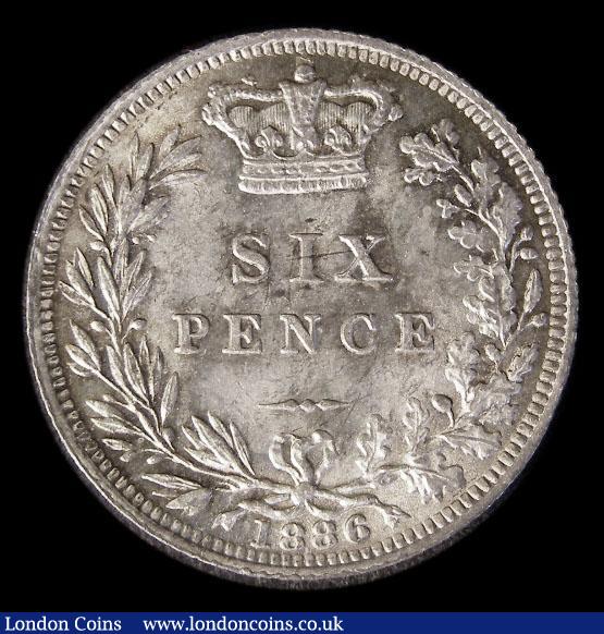 London Coins : A185 : Lot 1829 : Sixpence 1886 ESC 1748, Bull 3260  UNC and lustrous with choice golden tone, in an LCGS holder and g...