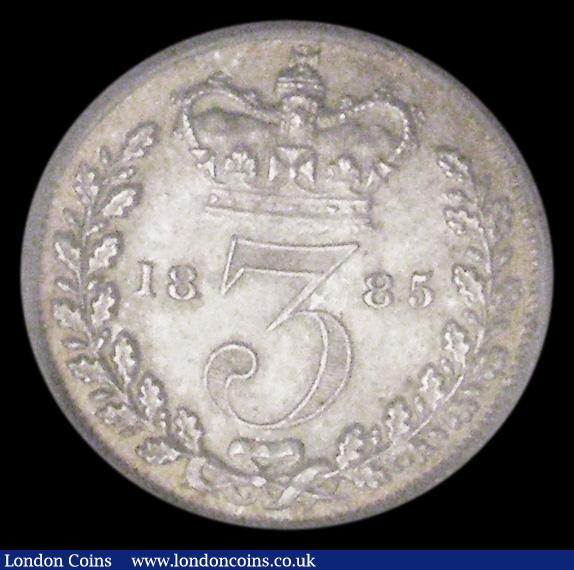 London Coins : A185 : Lot 1852 : Threepence 1885 ESC 2092, Bull 3431 UNC choice and lustrous, the obverse with touches of golden tone...