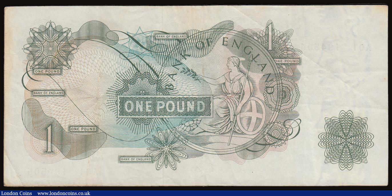 London Coins : A186 : Lot 101 : One Pound O'Brien 1960 Britannia reverse B281 first run A01 194505 VF with some faint brown sta...
