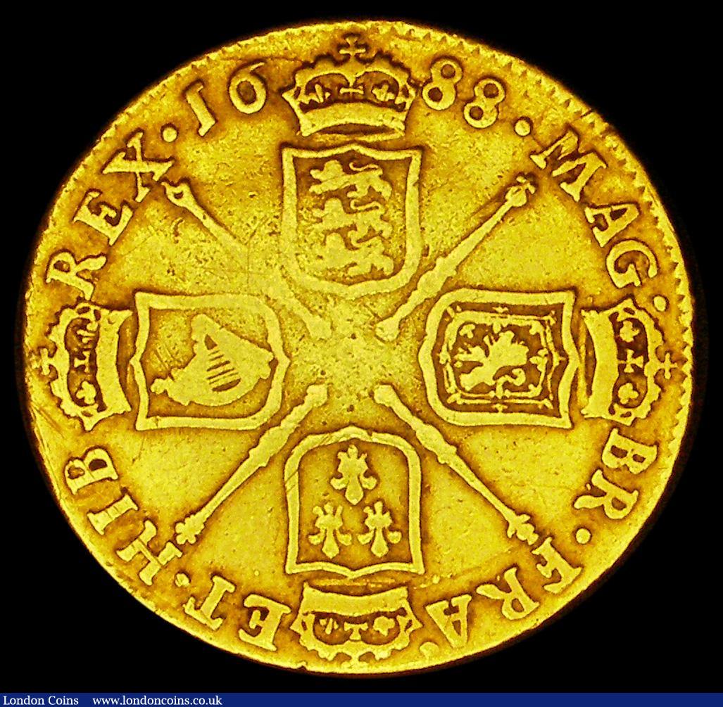 London Coins : A186 : Lot 1606 : Guinea 1688 S.3402 VG with some old scratches and scuffs, James II Guineas rare in all grades