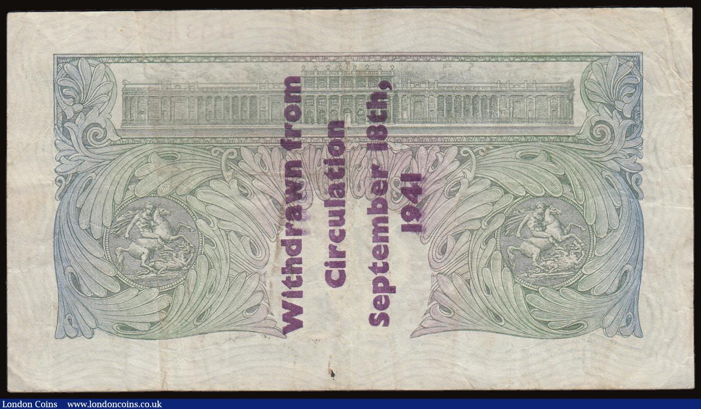 London Coins : A186 : Lot 33 : One Pound Peppiatt Guernsey Overprint B239A, serial number B63A 469277 'Withdrawn from Circulat...