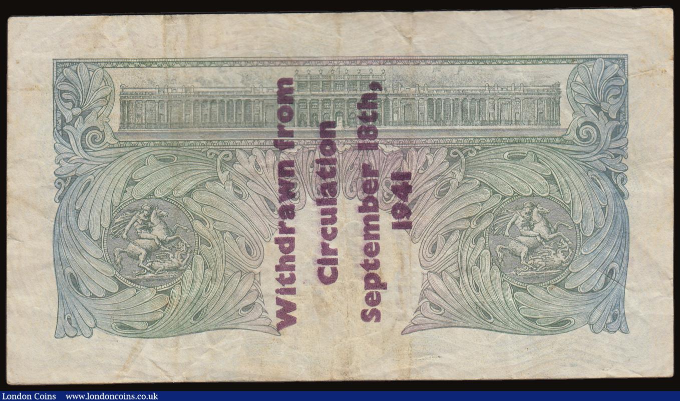 London Coins : A186 : Lot 34 : One Pound Peppiatt Guernsey Overprint B239A, serial number E09A 974263 'Withdrawn from Circulat...
