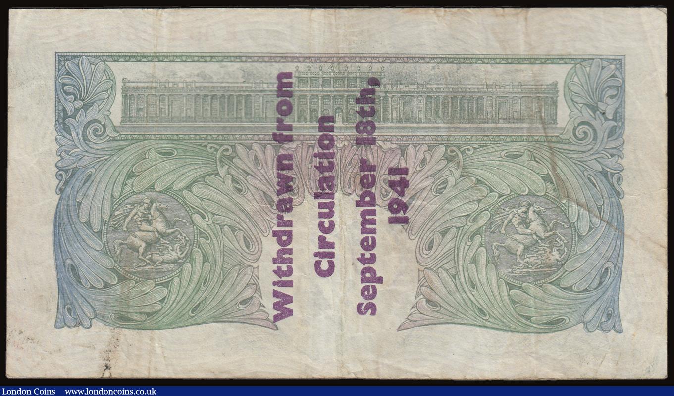 London Coins : A186 : Lot 35 : One Pound Peppiatt Guernsey Overprint B239A, serial number E45A 269642 'Withdrawn from Circulat...