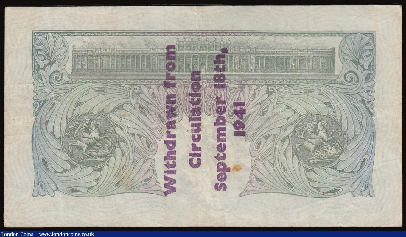 London Coins : A186 : Lot 36 : One Pound Peppiatt Guernsey Overprint B239A, serial number H19A 469454 'Withdrawn from Circulat...