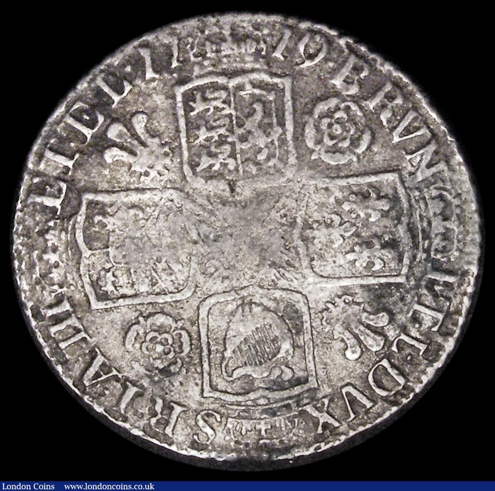London Coins : A187 : Lot 2265 : Shilling 1719 Roses and Plumes VG with pitted surfaces and some green residue on the French shield, ...