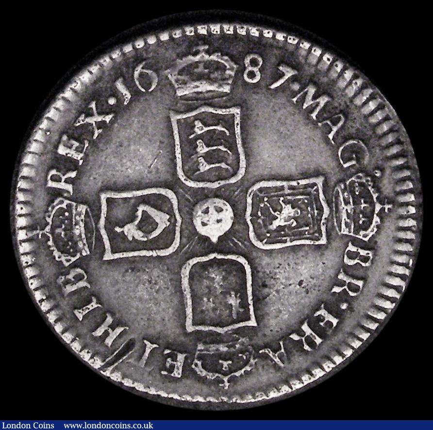 London Coins : A187 : Lot 2350 : Sixpence 1687 Late Shields ESC 1526B, Bull 777, Good Fine/NVF with grey tone and a heavier contact m...