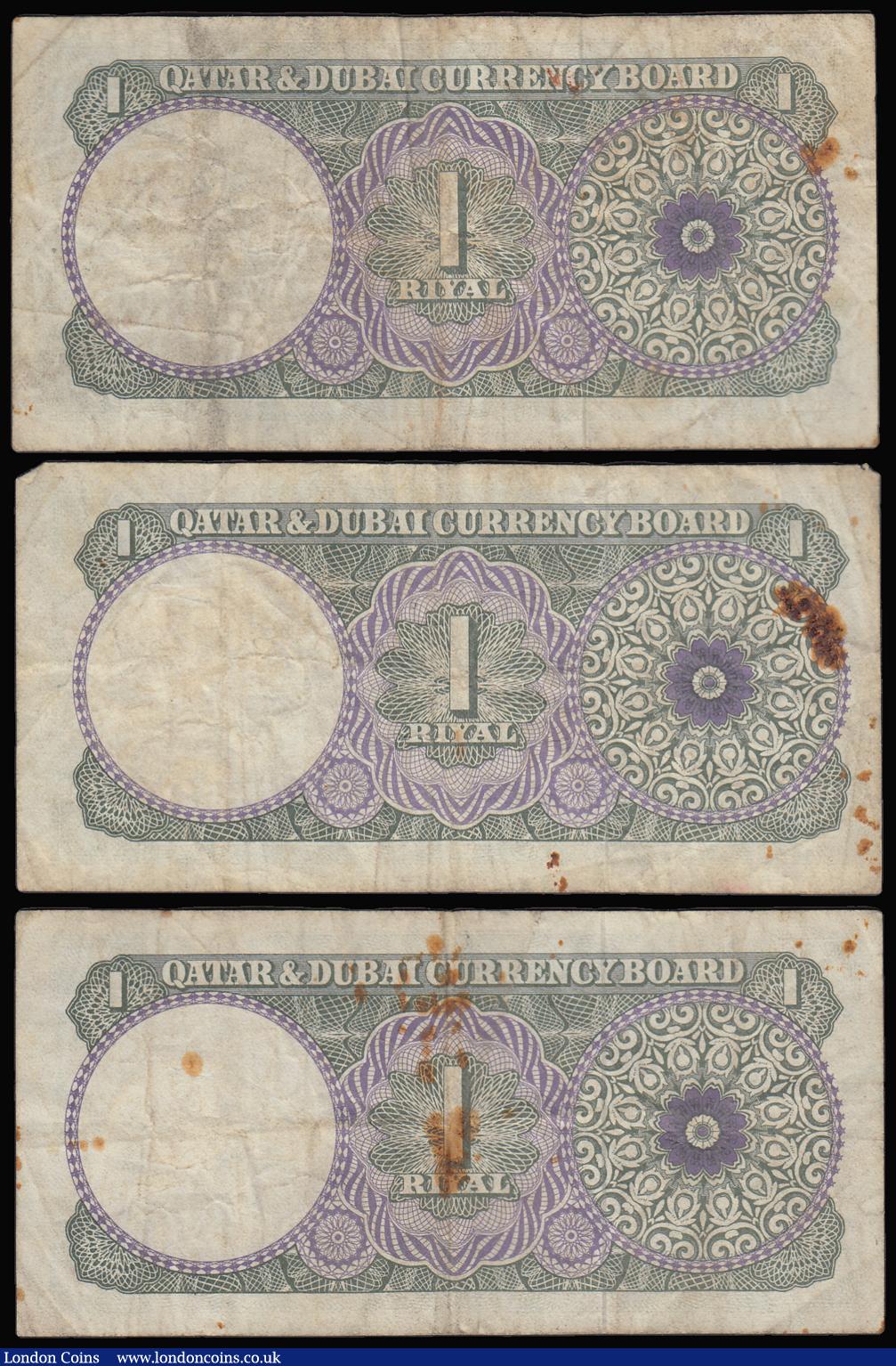 London Coins : A187 : Lot 381 : Qatar & Dubai Currency Board 1 Riyal Pick 1a ND (circa 1960's) featuring Dhow, Oil derrick ...
