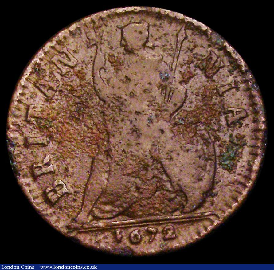 London Coins : A188 : Lot 1221 : Farthing 1672 First O over L in CAROLO (as Cooke Collection nos.753/754) VG with some corrosion and ...