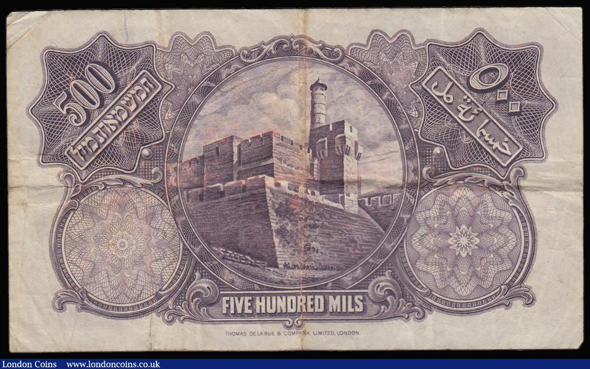 London Coins : A188 : Lot 209 : Palestine Currency Board 500 Mils 15.8.1945 Pick 6d series J535035 heavy central creases and some di...