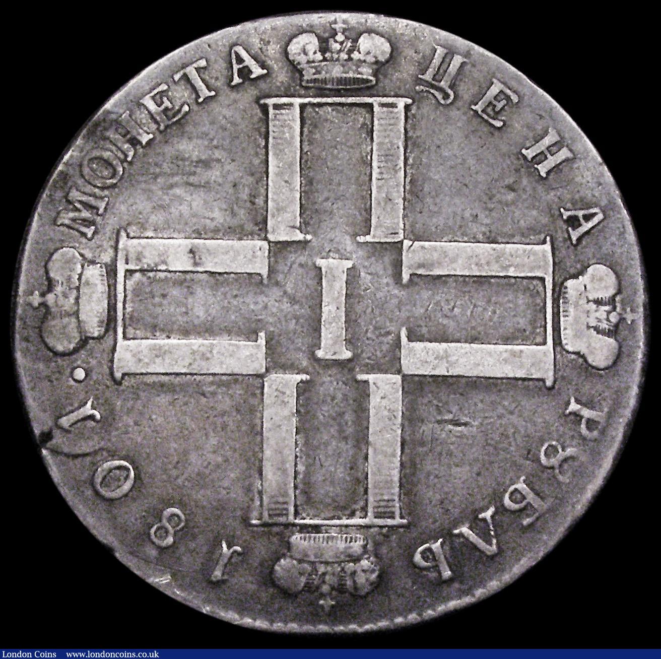 London Coins : A188 : Lot 928 : Russia One Rouble 1801A CM AИ Paul I, C#101a, Fine/VG weakly struck in the centre of the reverse, a...