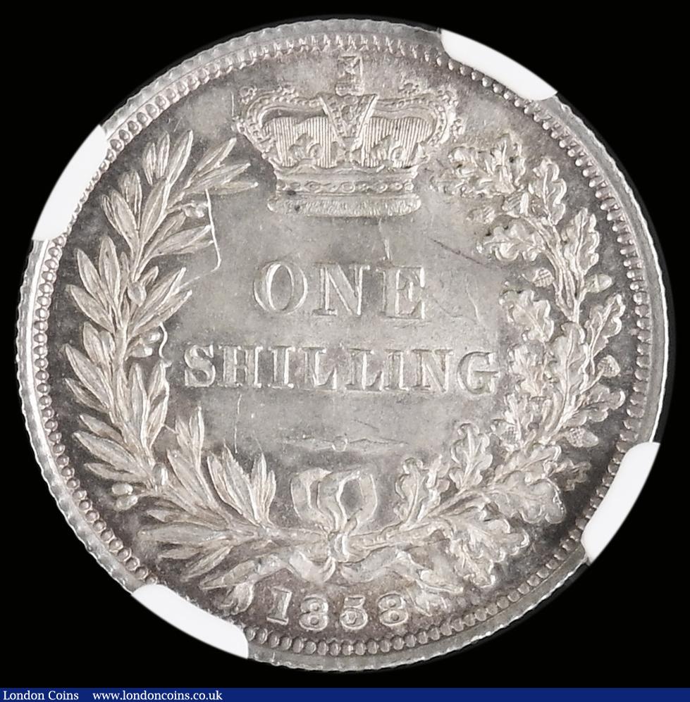 London Coins : A190 : Lot 2204 : Shilling 1858 Unc retaining some mint brilliance and with a pleasing peripheral tone reverse graded ...